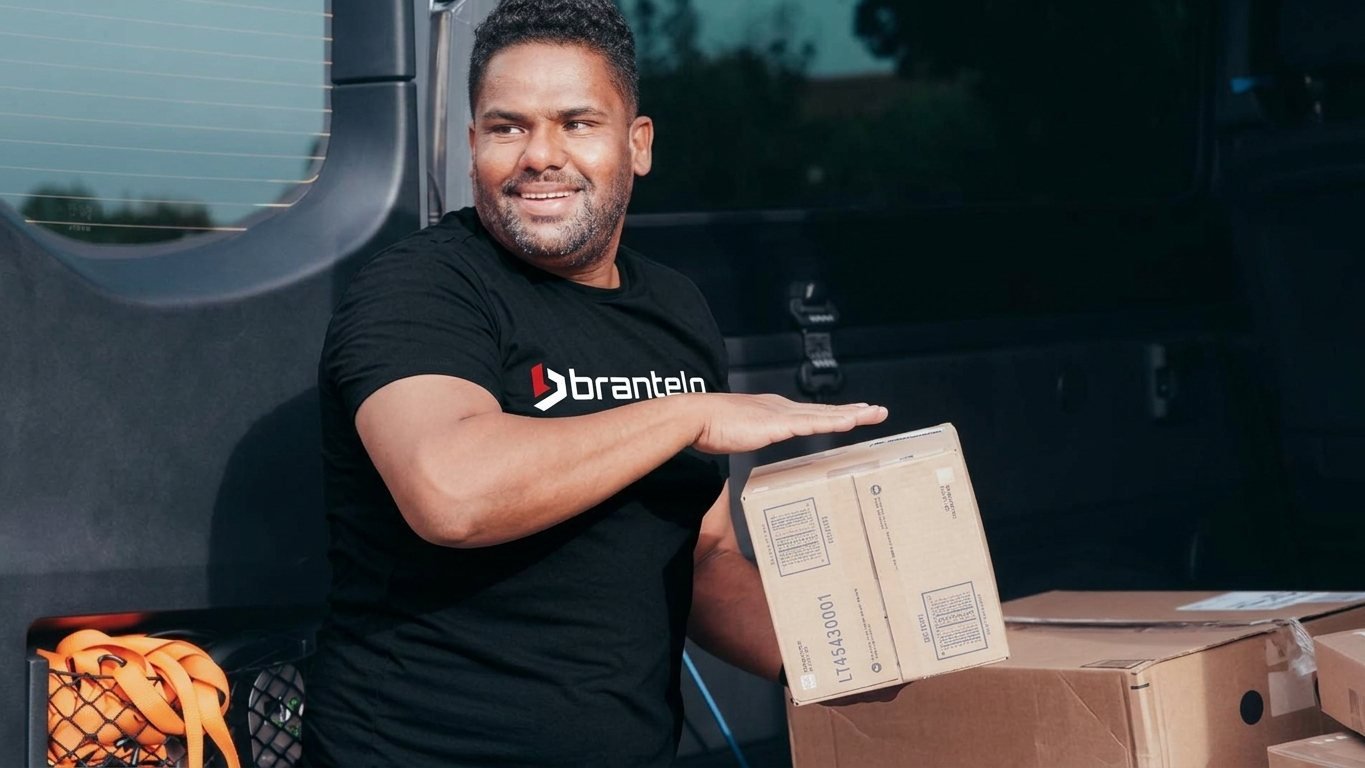 Why Choose Brantelo — reliable worldwide delivery of automotive and EV parts Brantelo courier delivering automotive and EV parts packages directly to a verified buyer